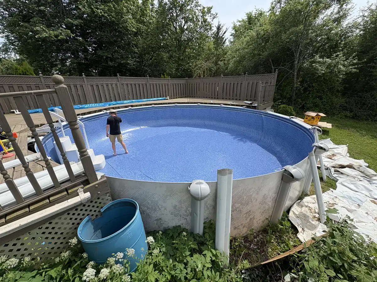 New liner installed in a round above ground pool before filling