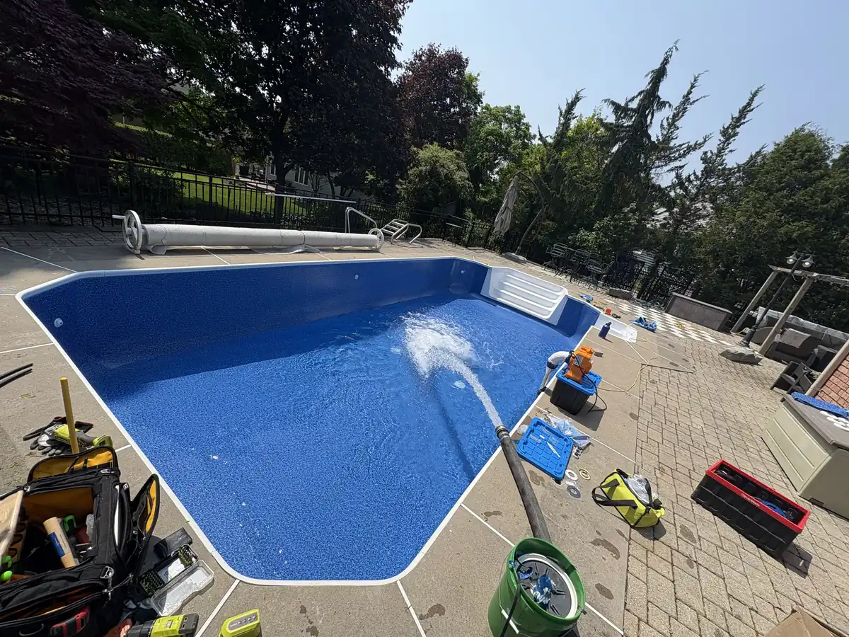 Rectangular pool with a new liner filling with water